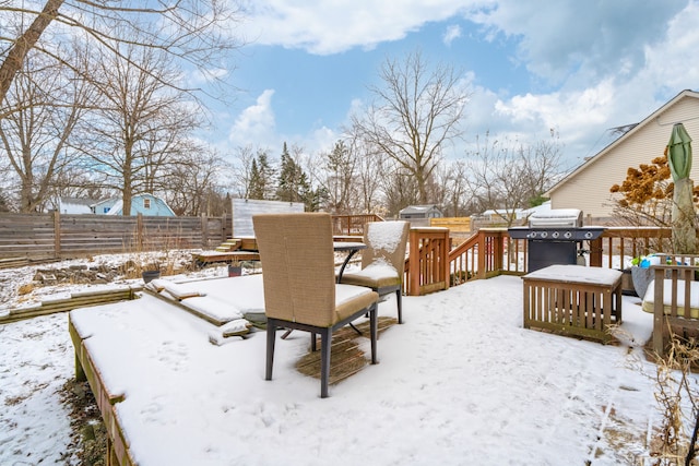 view of yard layered in snow