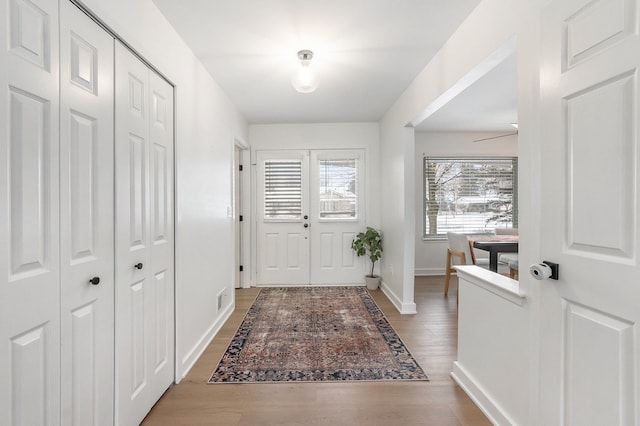 entrance foyer featuring hardwood / wood-style floors