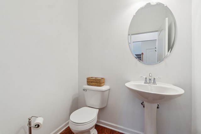 bathroom with toilet and sink