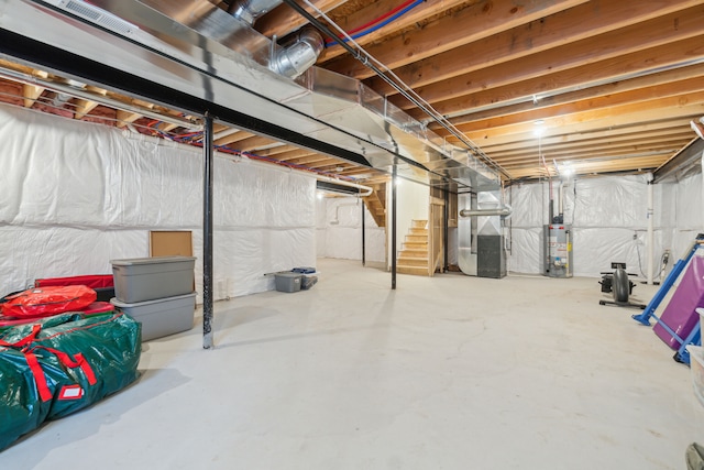 basement with heating unit and water heater