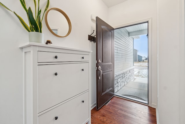 doorway featuring dark hardwood / wood-style flooring