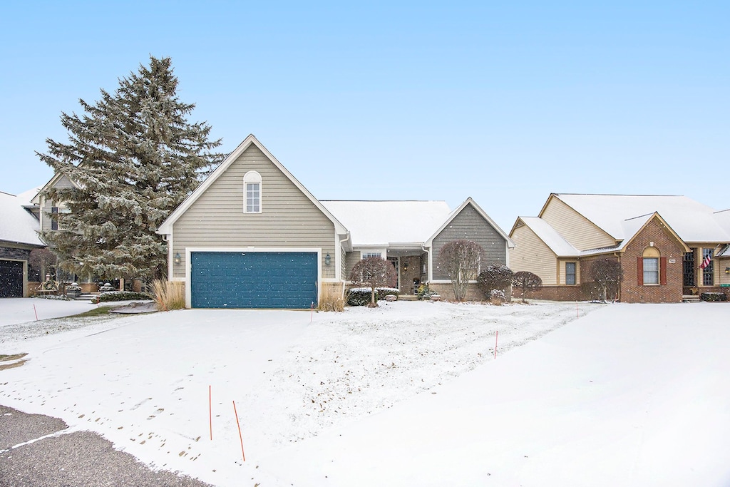 view of front of property featuring a garage