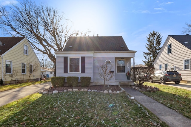 view of front of property with a front lawn