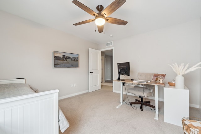 carpeted bedroom with ceiling fan