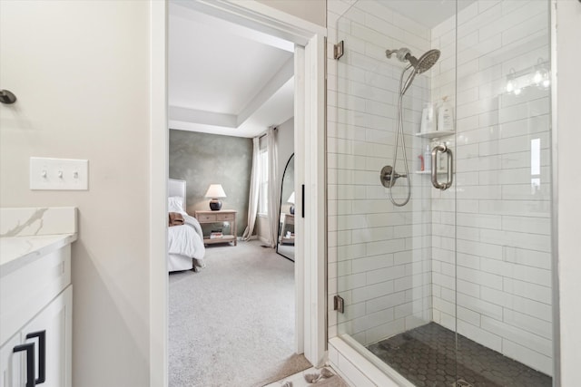 bathroom with vanity and walk in shower