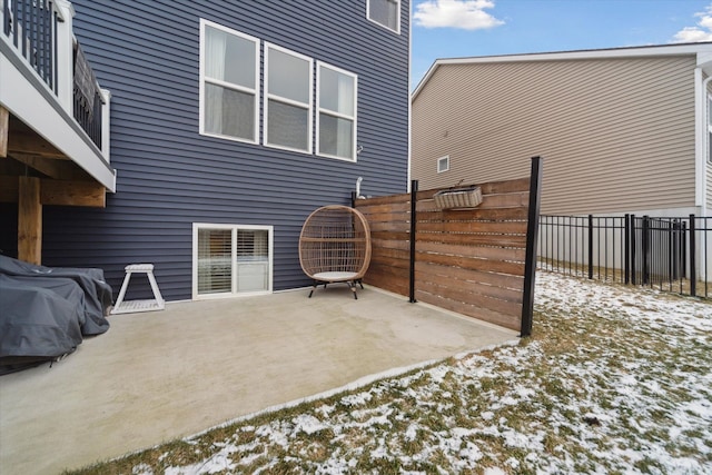 view of snow covered patio