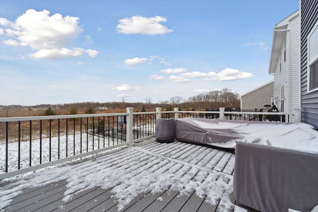 view of snow covered deck