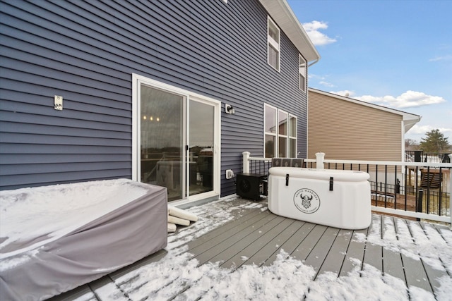 view of snow covered deck