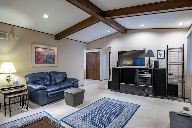 living room featuring lofted ceiling with beams and light colored carpet