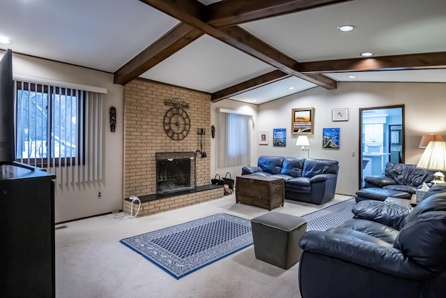 living room with a brick fireplace, light carpet, and vaulted ceiling with beams