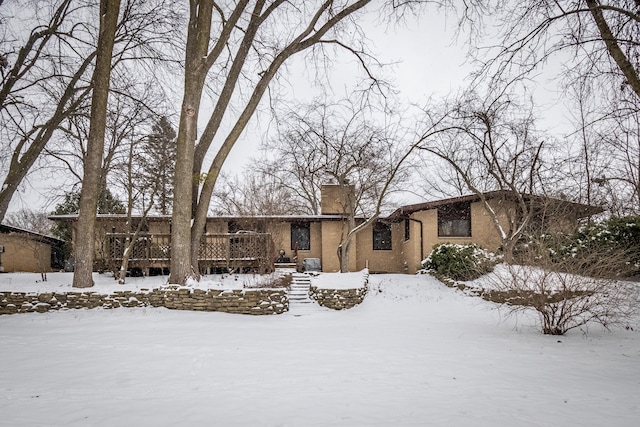 view of front of property featuring a deck