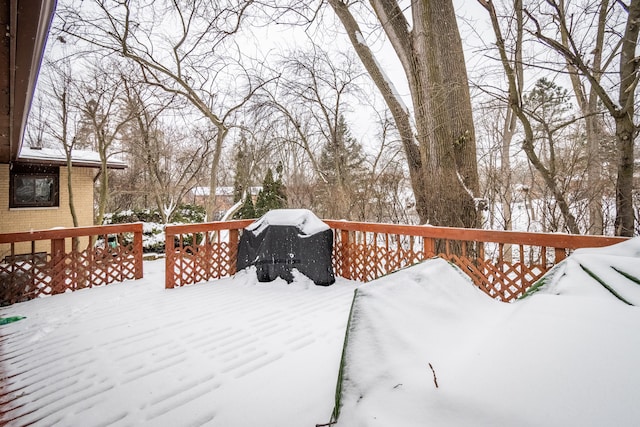 view of snow covered deck