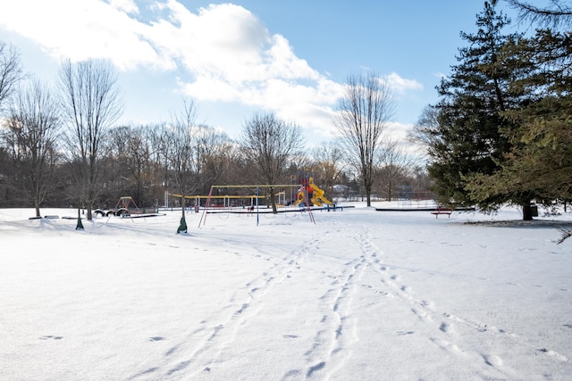 view of yard layered in snow