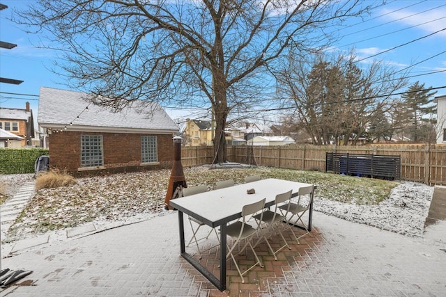 view of snow covered patio