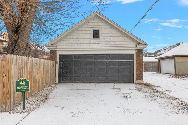 view of snow covered garage