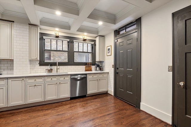 kitchen with sink, white cabinets, dishwasher, and beamed ceiling