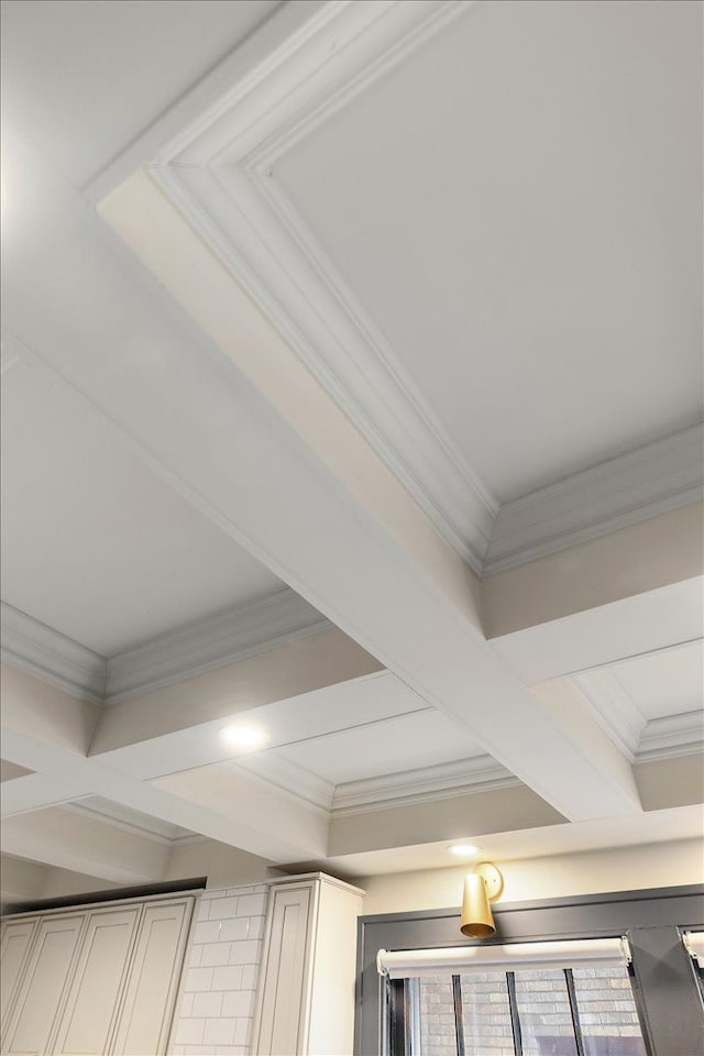 details with crown molding and beamed ceiling