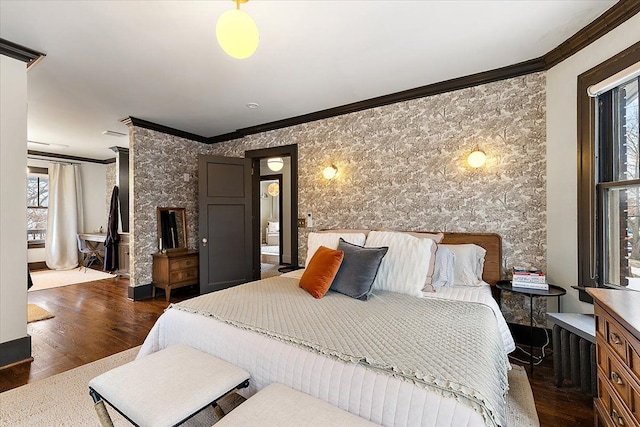 bedroom featuring dark wood-type flooring and ornamental molding