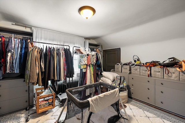 spacious closet with vaulted ceiling