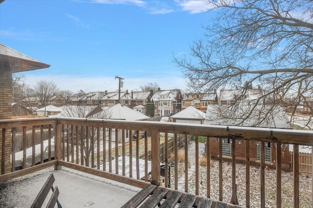 view of snow covered deck