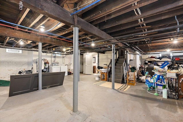 basement featuring washing machine and dryer