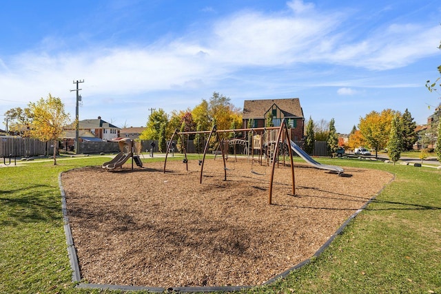 view of playground with a yard