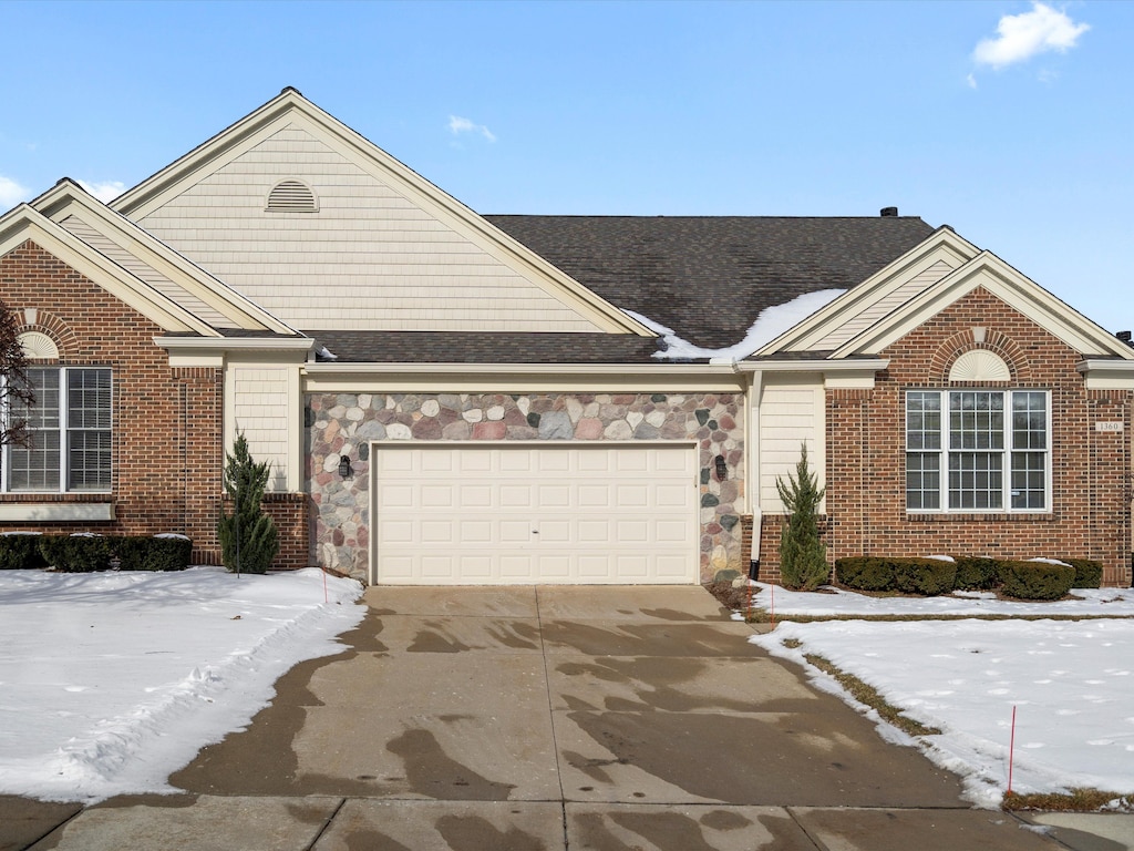 view of front of property featuring a garage