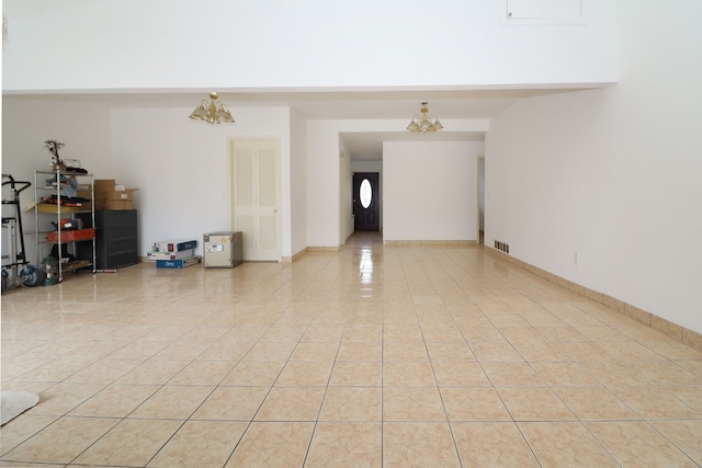 empty room with a chandelier