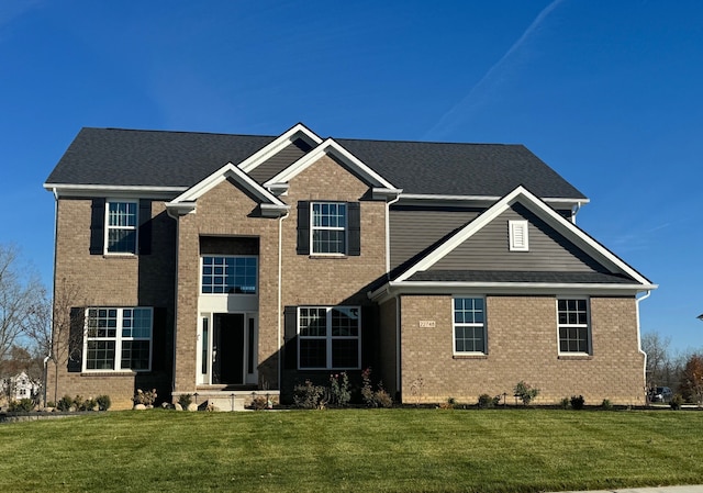 view of front of home with a front yard