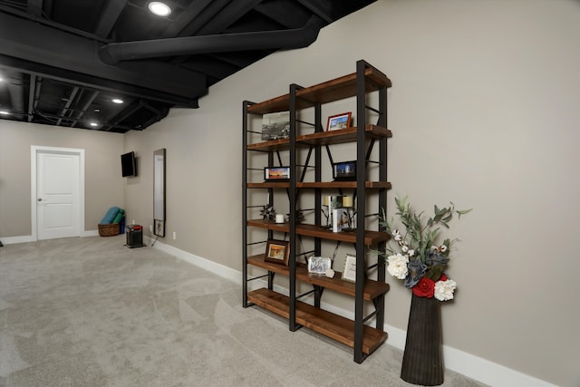 basement with light colored carpet