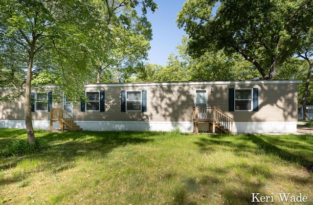 view of front of house with a front lawn