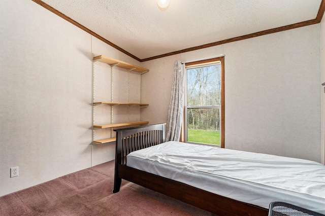 bedroom featuring a textured ceiling, carpet floors, vaulted ceiling, and crown molding