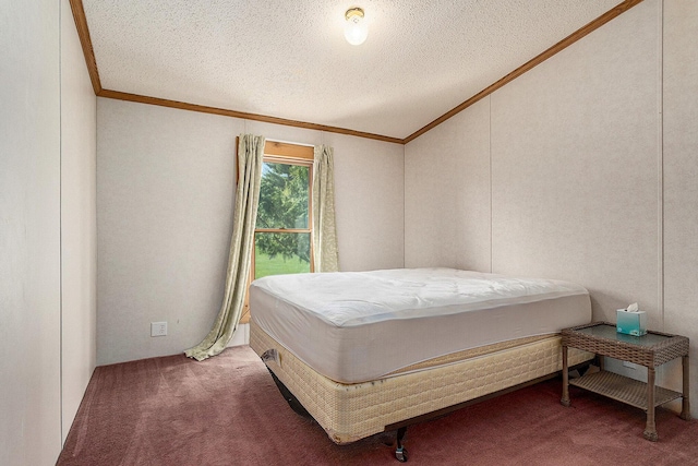 carpeted bedroom with a textured ceiling