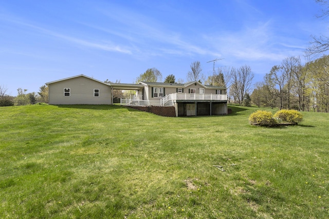 view of yard with a deck