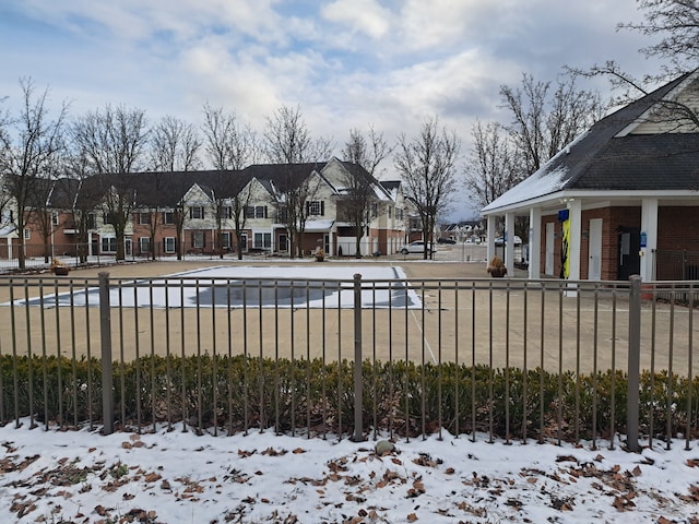 view of snow covered pool