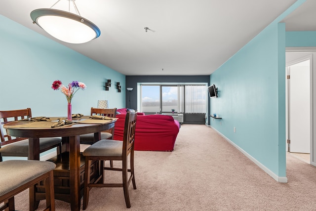 dining area with carpet