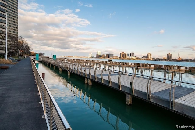 view of dock with a water view