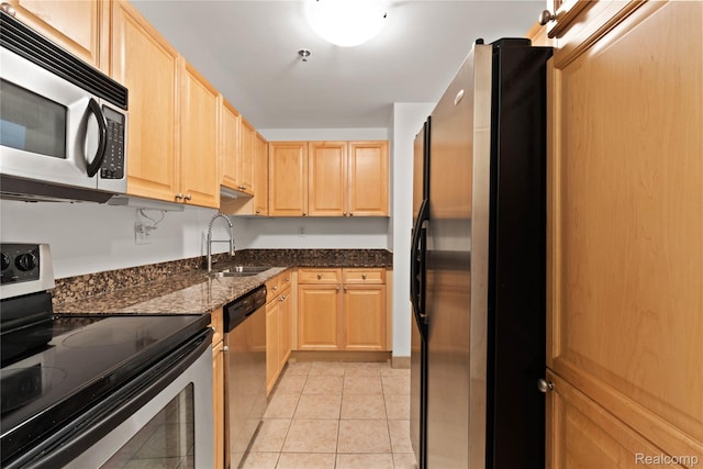 1001 W Jefferson Ave Unit 10E, Detroit, MI 48226 - kitchen with appliances with stainless steel finishes, light brown cabinets, a sink, and light tile patterned floors