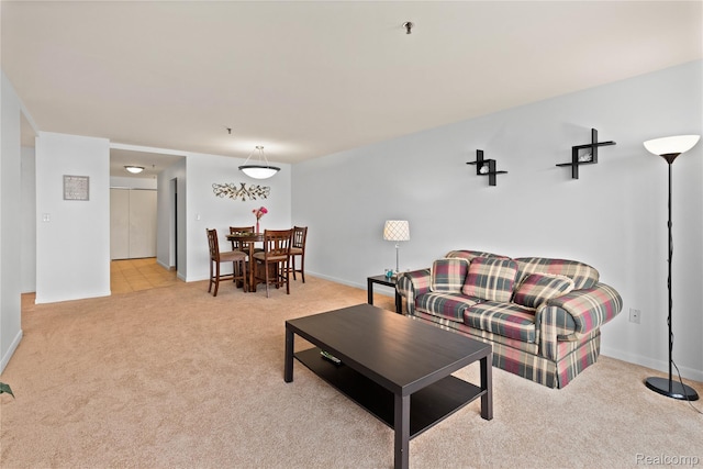 1001 W Jefferson Ave Unit 10E, Detroit, MI 48226 - living area with light carpet and baseboards