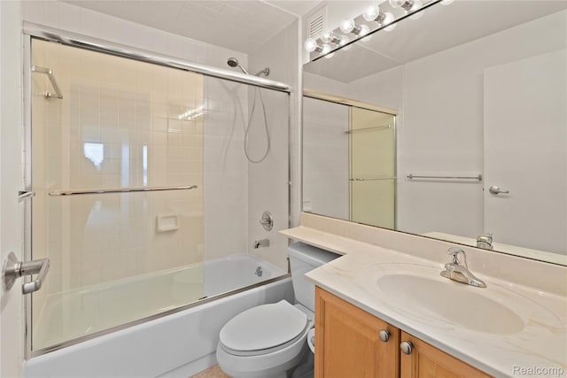 1001 W Jefferson Ave Unit 10E, Detroit, MI 48226 - full bath featuring vanity, shower / bath combination with glass door, and toilet