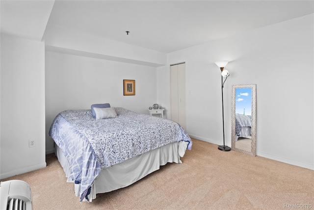1001 W Jefferson Ave Unit 10E, Detroit, MI 48226 - bedroom featuring carpet flooring and baseboards