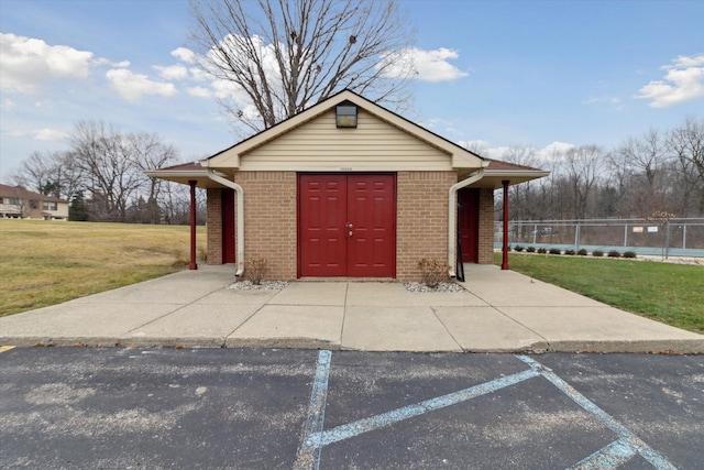 view of outdoor structure with a yard