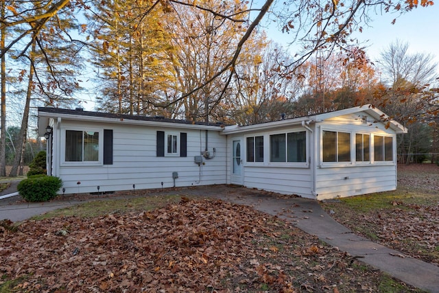 single story home with a sunroom