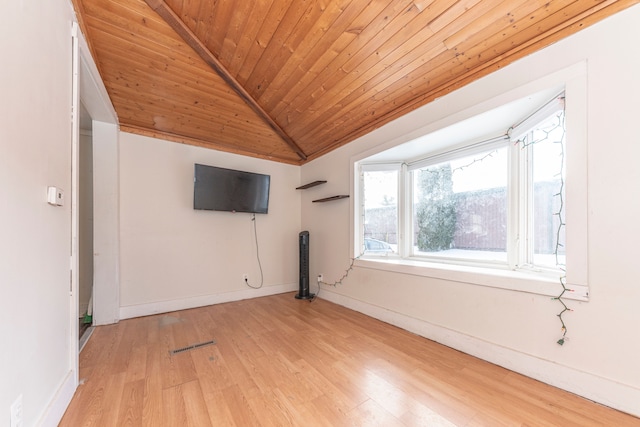 interior space with vaulted ceiling, wood ceiling, and light hardwood / wood-style floors