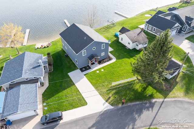 aerial view with a water view and a residential view