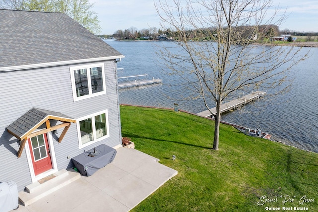 view of yard featuring a water view and entry steps