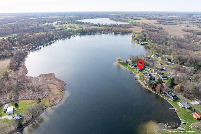 bird's eye view with a water view