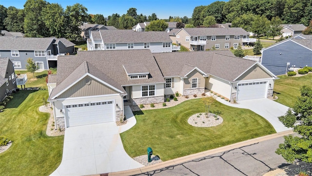 2519 Hunters Run Unit 101, Kalamazoo, MI 49048 - view of front of house featuring a garage