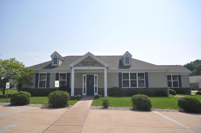 2519 Hunters Run Unit 101, Kalamazoo, MI 49048 - view of front facade with a front yard