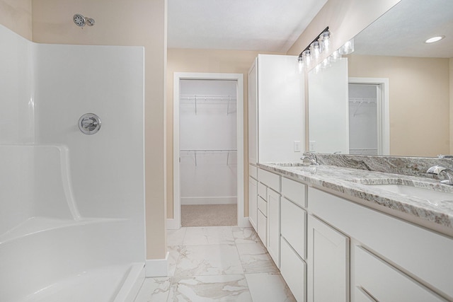 2519 Hunters Run Unit 101, Kalamazoo, MI 49048 - bathroom with vanity and walk in shower